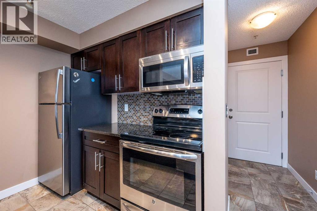 8206, 403 Mackenzie Way Sw, Airdrie, Alberta  T4B 3V7 - Photo 8 - A2289815