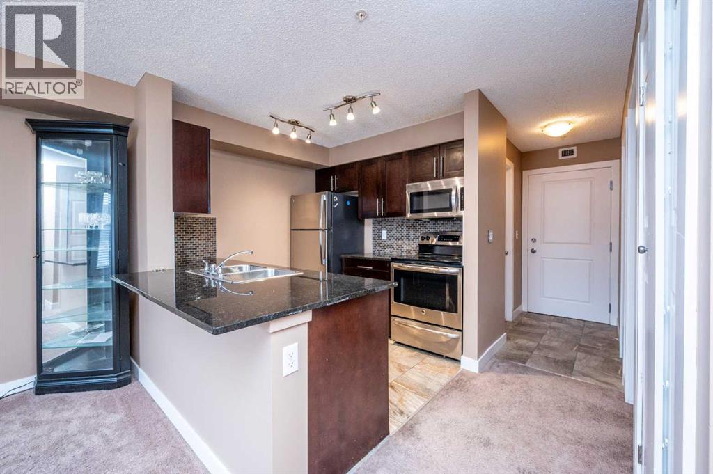 8206, 403 Mackenzie Way Sw, Airdrie, Alberta  T4B 3V7 - Photo 7 - A2289815