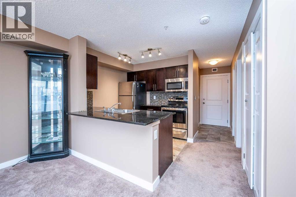 8206, 403 Mackenzie Way Sw, Airdrie, Alberta  T4B 3V7 - Photo 5 - A2289815