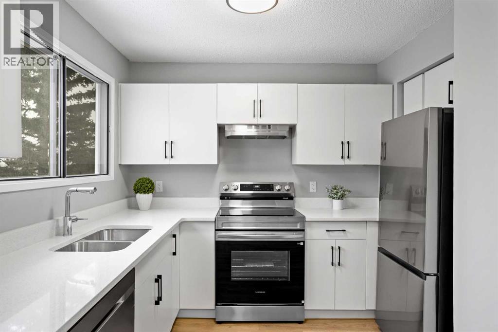 8, 6915 Ranchview Drive Nw, Calgary, Alberta  T3G 1R8 - Photo 2 - A2290120