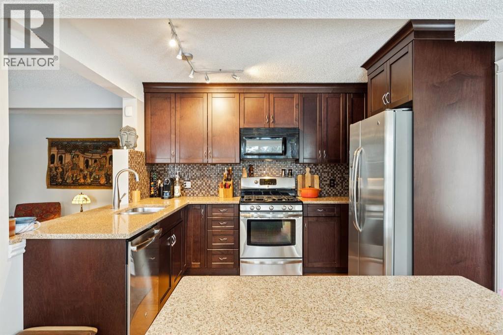 4 Wood Valley Rise Sw, Calgary, Alberta  T2W 5X5 - Photo 9 - A2292225