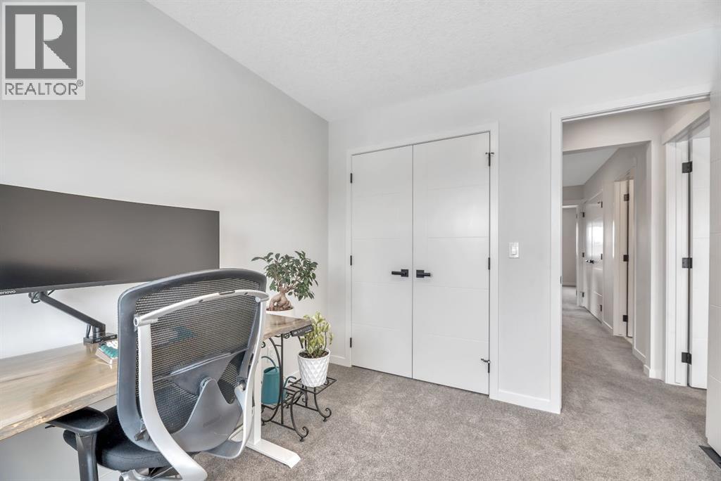 559 Wolf Creek Way Se, Calgary, Alberta  T2X 4Y9 - Photo 29 - A2289317