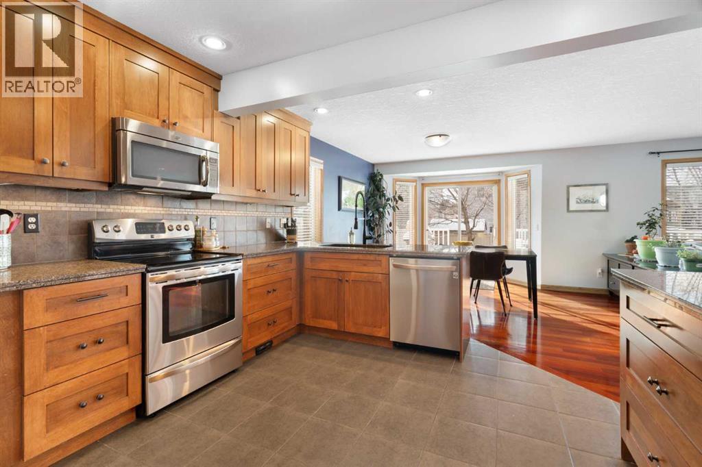 64 Woodside Park Nw, Airdrie, Alberta  T4B 2J9 - Photo 7 - A2289750