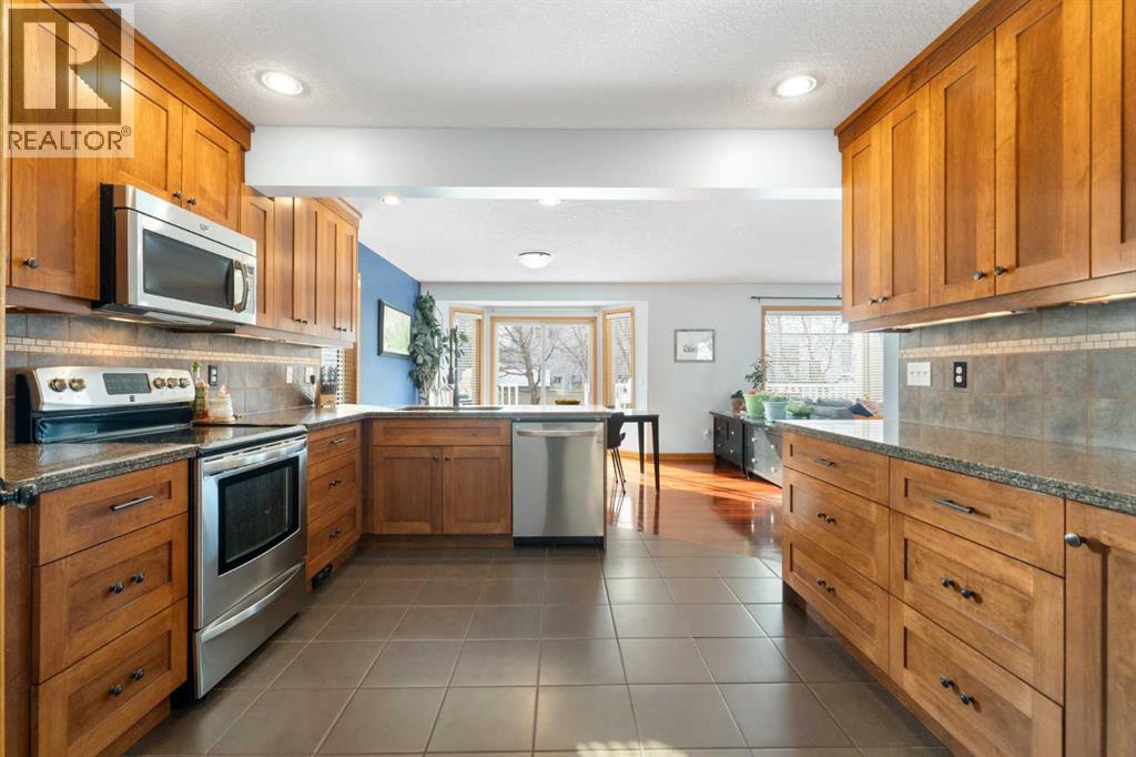 64 Woodside Park Nw, Airdrie, Alberta  T4B 2J9 - Photo 6 - A2289750