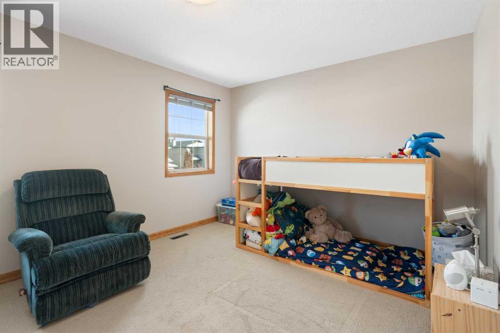 64 Woodside Park Nw, Airdrie, Alberta  T4B 2J9 - Photo 37 - A2289750