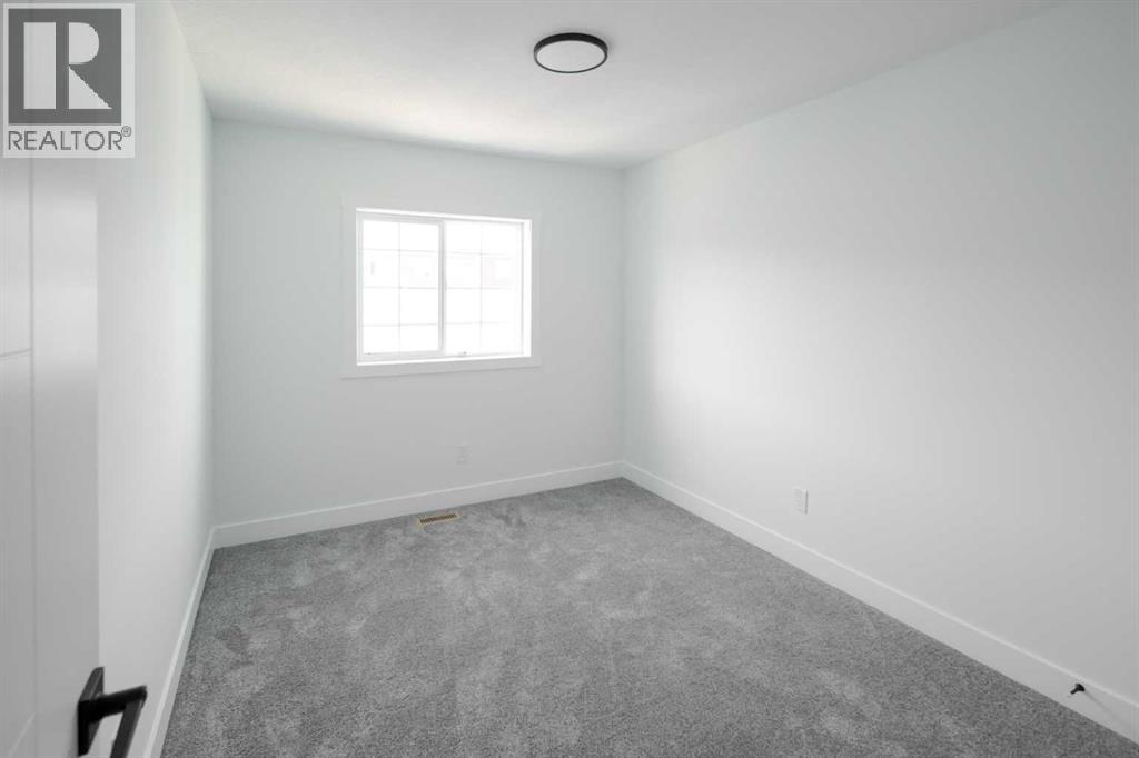 55 Baysprings Terrace Sw, Airdrie, Alberta  T4B 4A7 - Photo 16 - A2266129