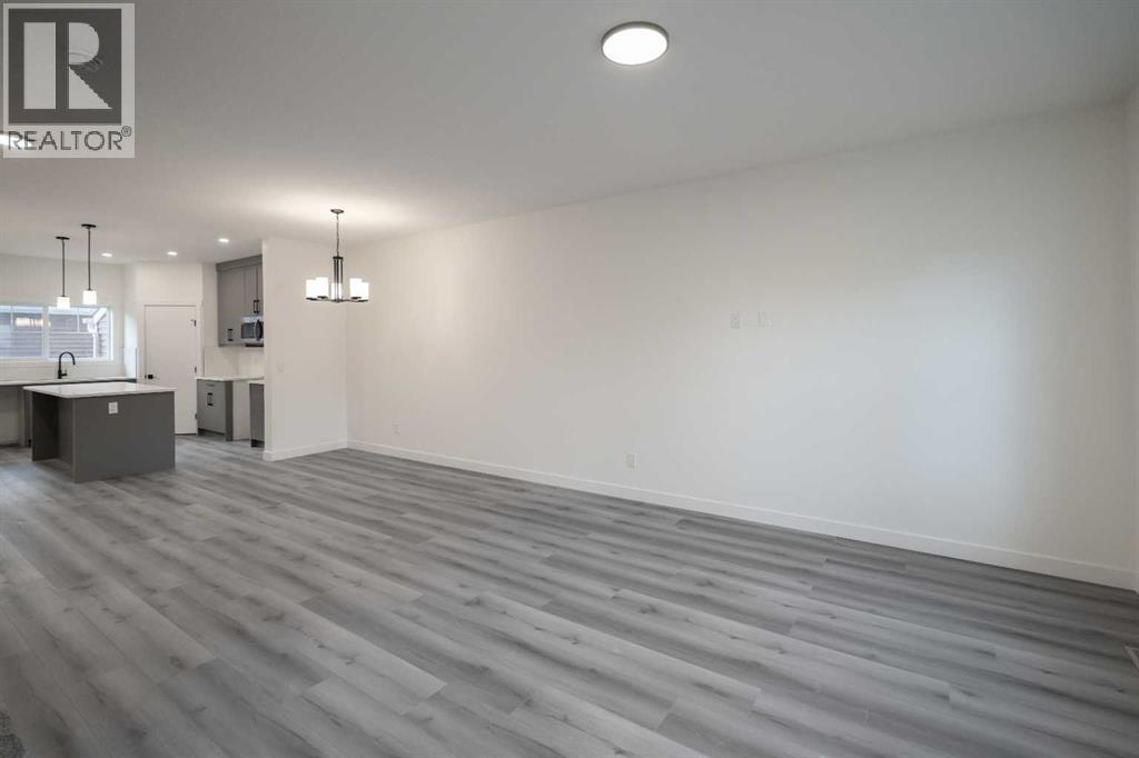 55 Baysprings Terrace Sw, Airdrie, Alberta  T4B 4A7 - Photo 5 - A2266129