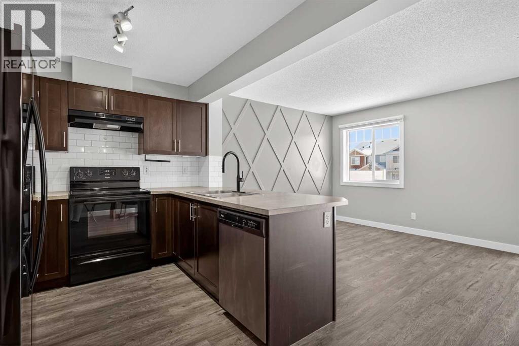 254 Pantego Lane Nw, Calgary, Alberta  T3K 0T1 - Photo 6 - A2288152