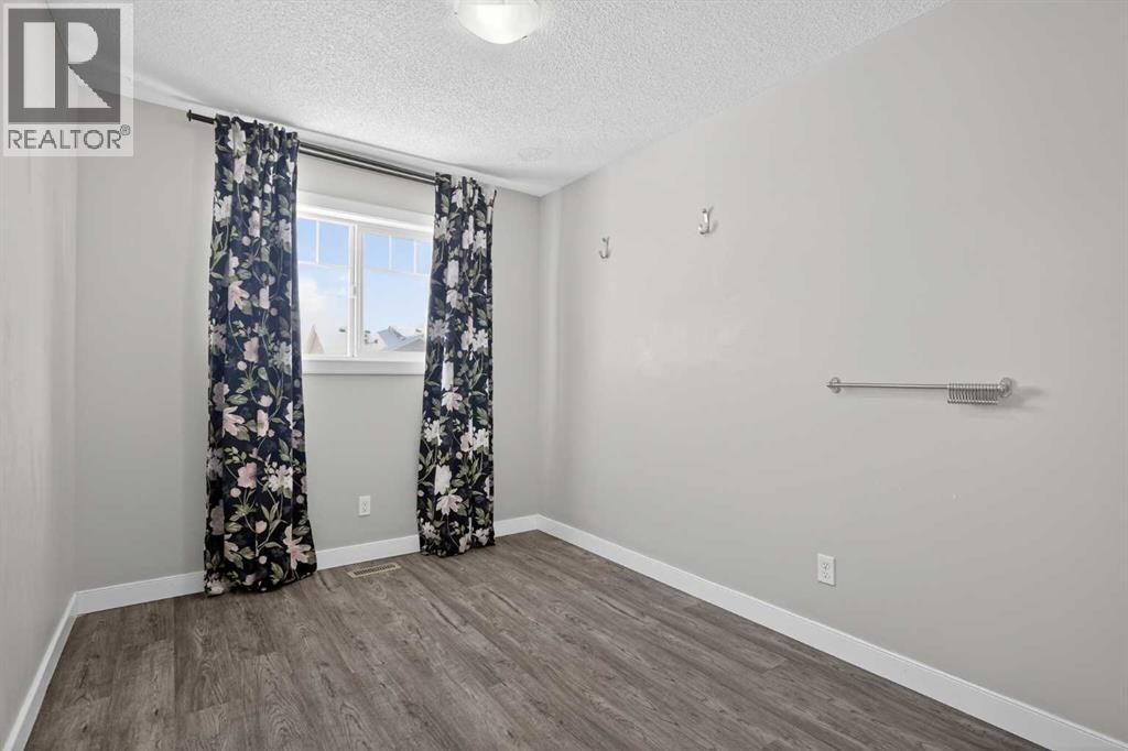254 Pantego Lane Nw, Calgary, Alberta  T3K 0T1 - Photo 15 - A2288152