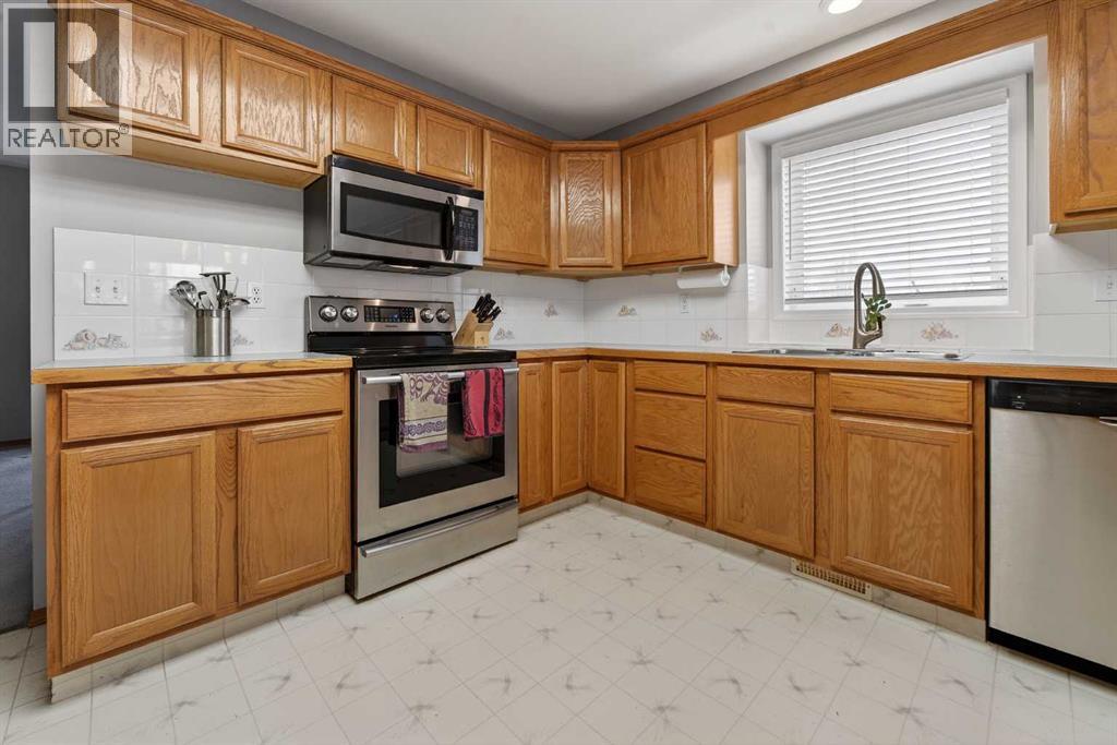 95 Stoney Crescent W, Lethbridge, Alberta  T1K 7B2 - Photo 7 - A2289473