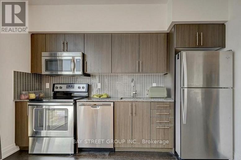 515 - 65 Speers Road, Oakville (Co Central), Ontario  L6K 0J1 - Photo 2 - W12870256