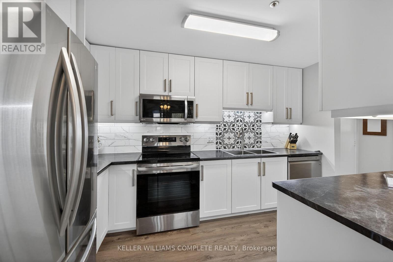 208 - 6 Niagara Street, Grimsby (Grimsby West), Ontario  L3M 5A4 - Photo 5 - X12870300