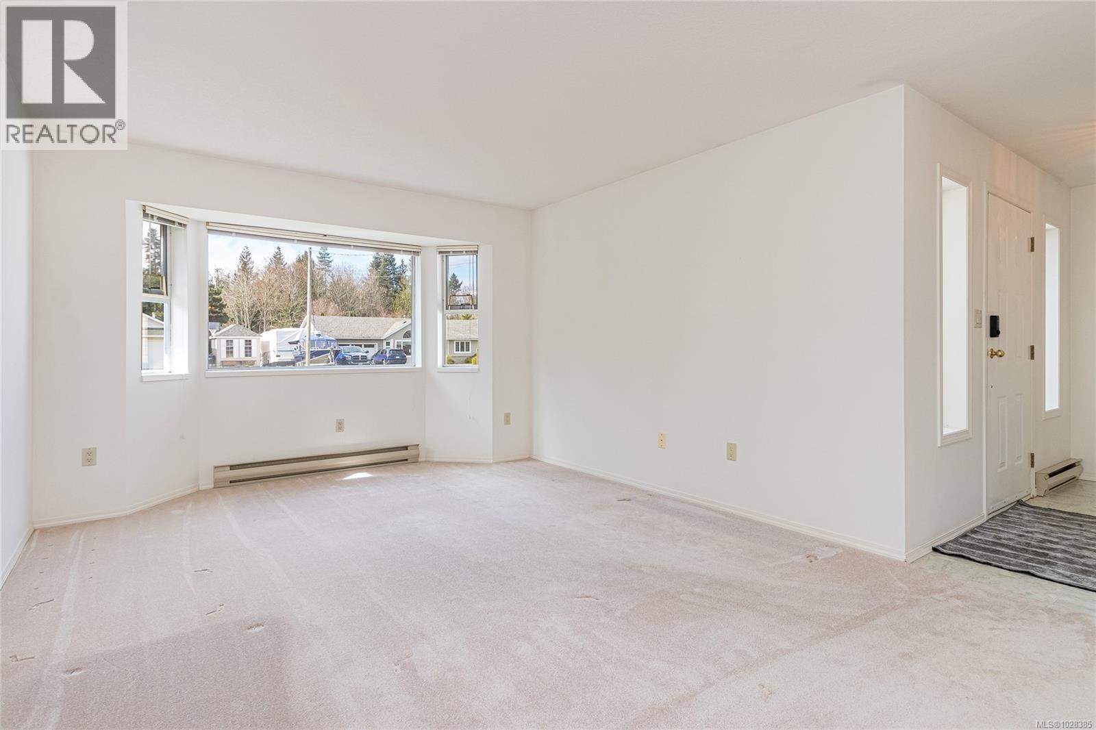 700 Arbutus St, Qualicum Beach, British Columbia  V9K 1K4 - Photo 10 - 1028385