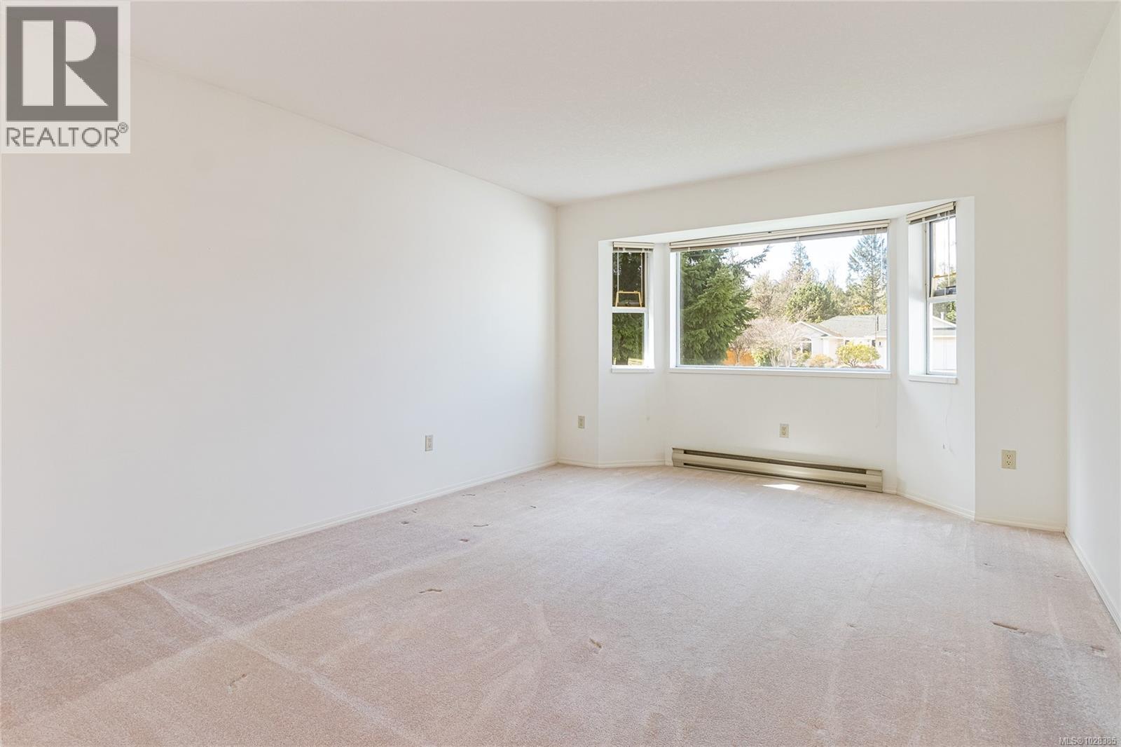 700 Arbutus St, Qualicum Beach, British Columbia  V9K 1K4 - Photo 9 - 1028385