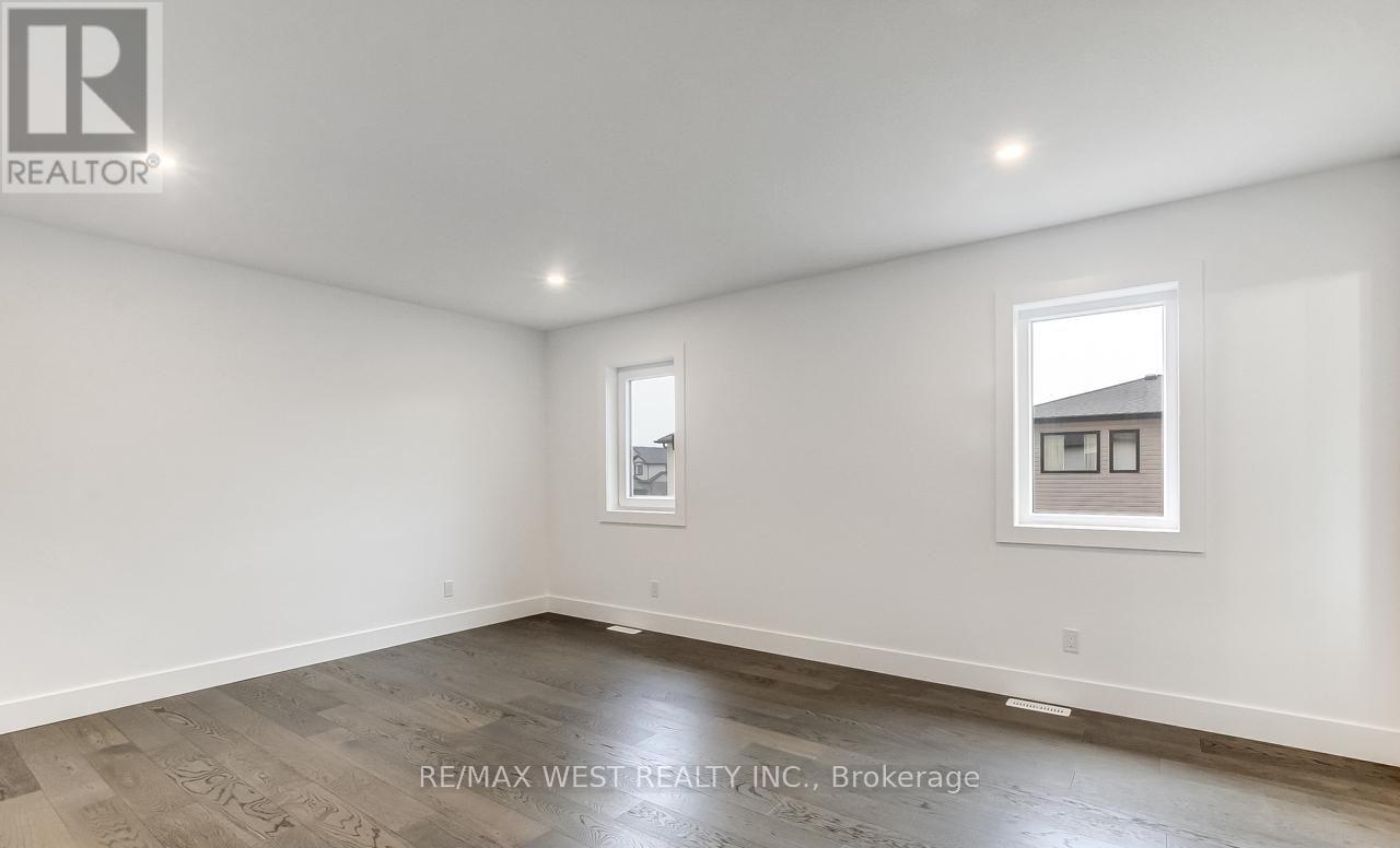 92 Poole Crescent, Middlesex Centre, Ontario  N0L 1R0 - Photo 18 - X12858336