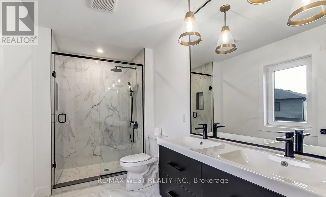 92 Poole Crescent, Middlesex Centre, Ontario  N0L 1R0 - Photo 21 - X12858336