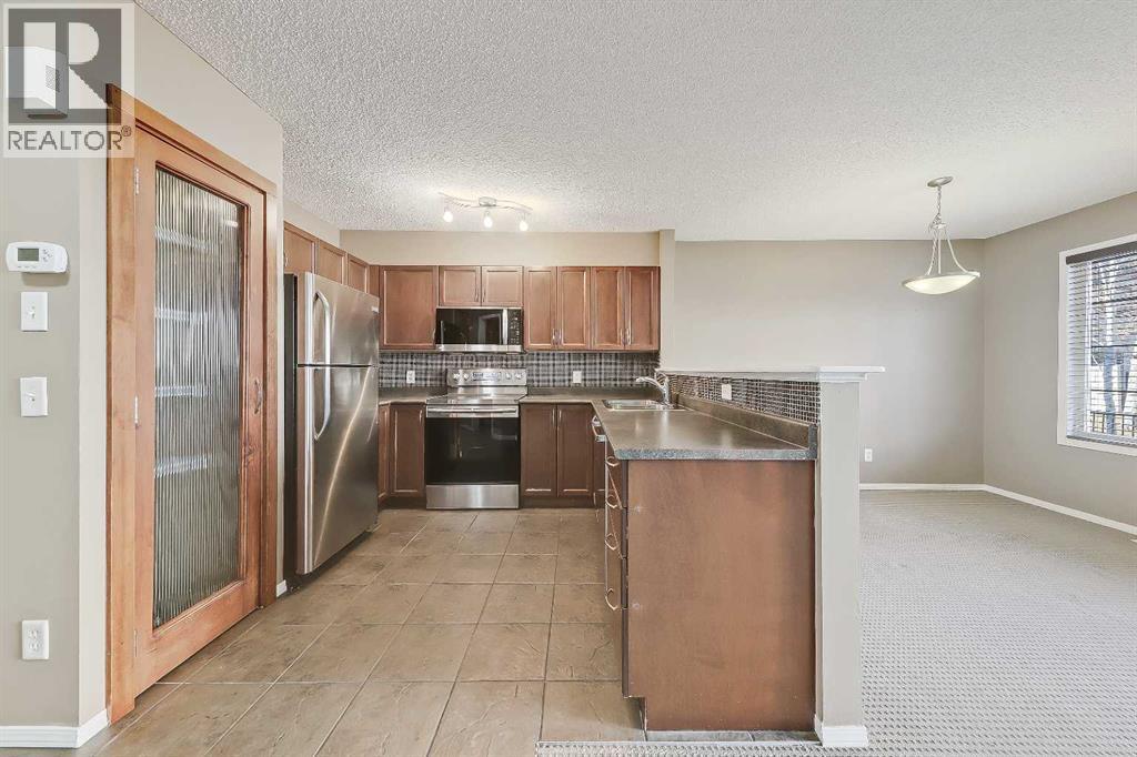 161 Eversyde Common Sw, Calgary, Alberta  T2Y 4Z5 - Photo 3 - A2285414