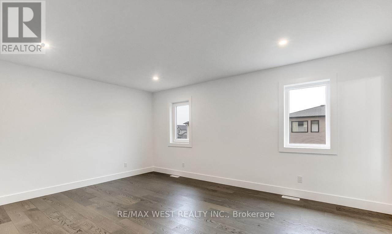 92 Poole Crescent, Middlesex Centre, Ontario  N0L 1R0 - Photo 18 - X12858342