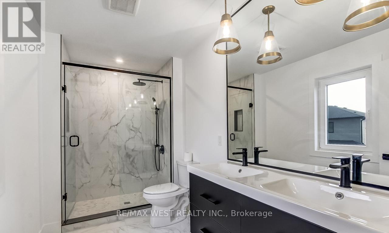 92 Poole Crescent, Middlesex Centre, Ontario  N0L 1R0 - Photo 21 - X12858342