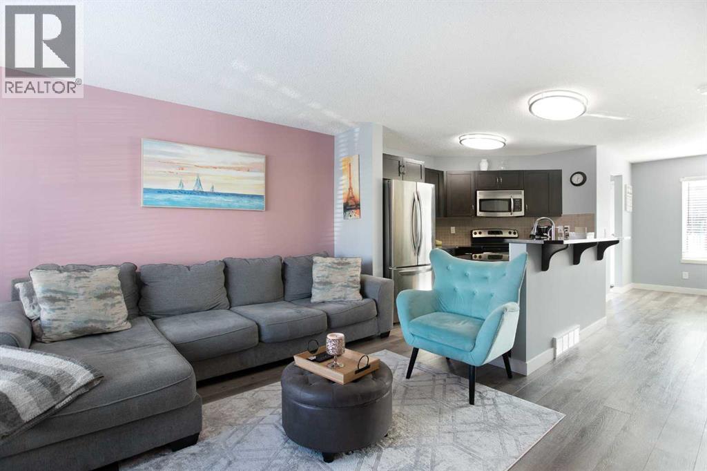 1074 Panatella Boulevard Nw, Calgary, Alberta  T3K 0L2 - Photo 4 - A2290705