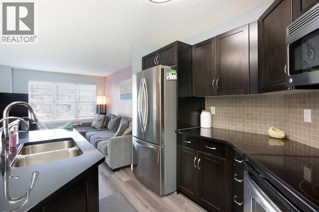 1074 Panatella Boulevard Nw, Calgary, Alberta  T3K 0L2 - Photo 9 - A2290705