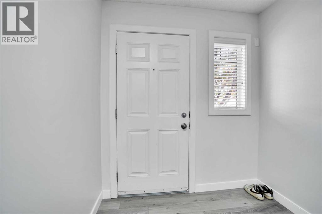 137 Pantego Lane Nw, Calgary, Alberta  T3K 0T1 - Photo 2 - A2292494