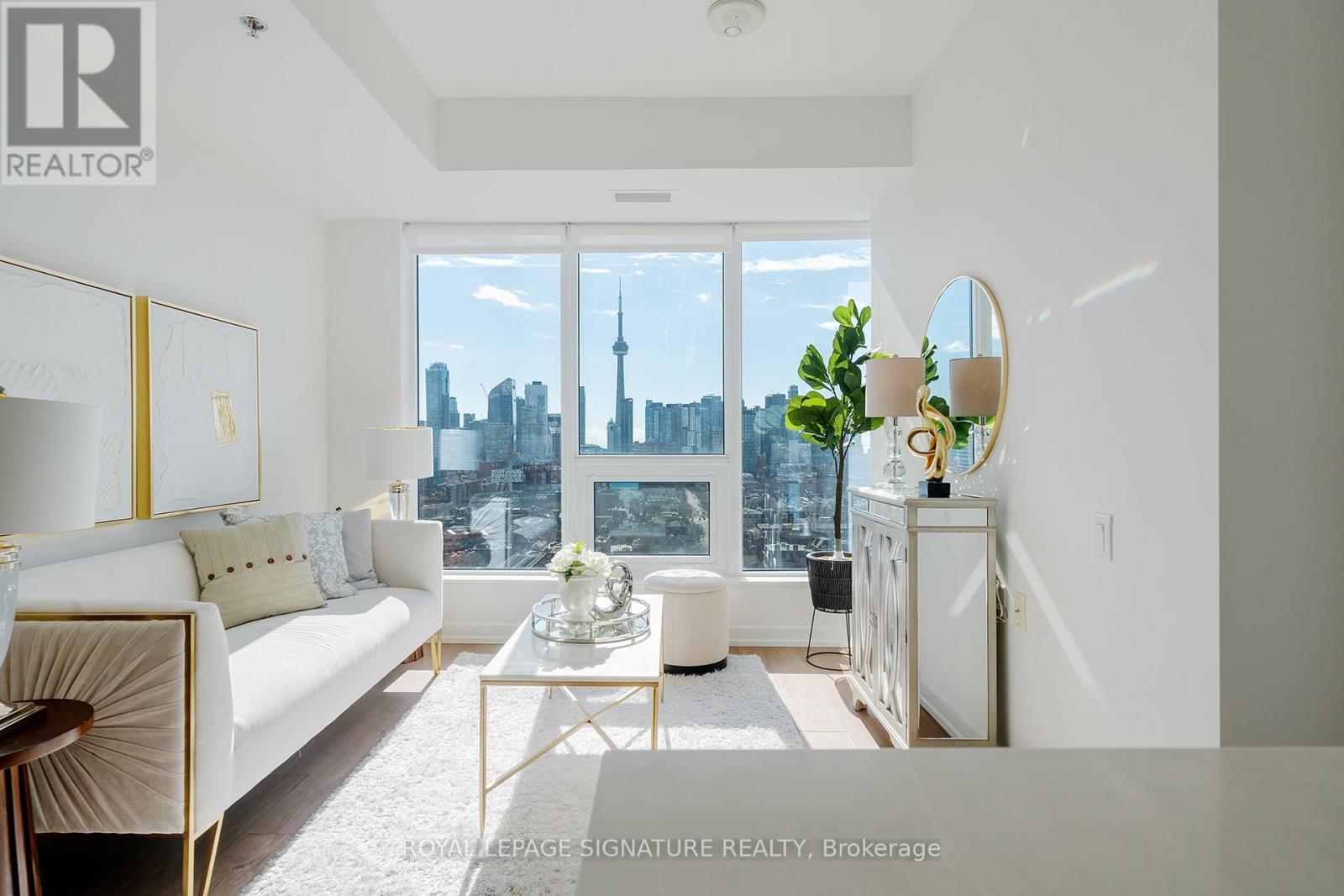 <div class="slider-price">$688,000</div><p>1701 - 203 College Street, Toronto, Ontario</p>