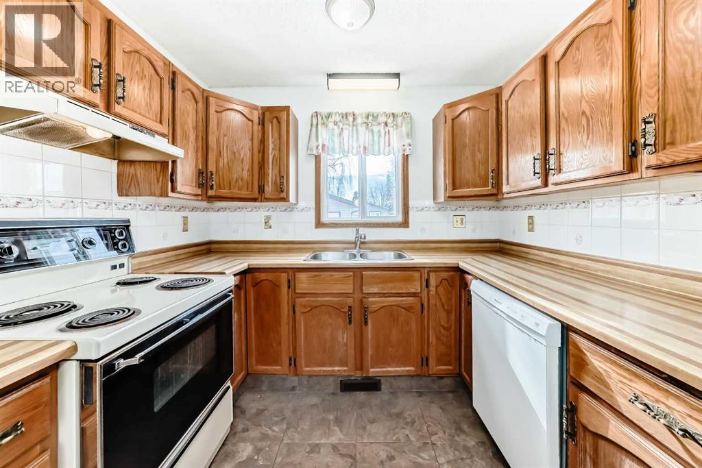 1837 Meadowbrook Drive Se, Airdrie, Alberta  T4A 1V5 - Photo 11 - A2287190