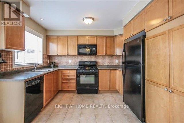 863 Mcduffe Crescent, Milton, Ontario  L9T 6M8 - Photo 4 - W12871476