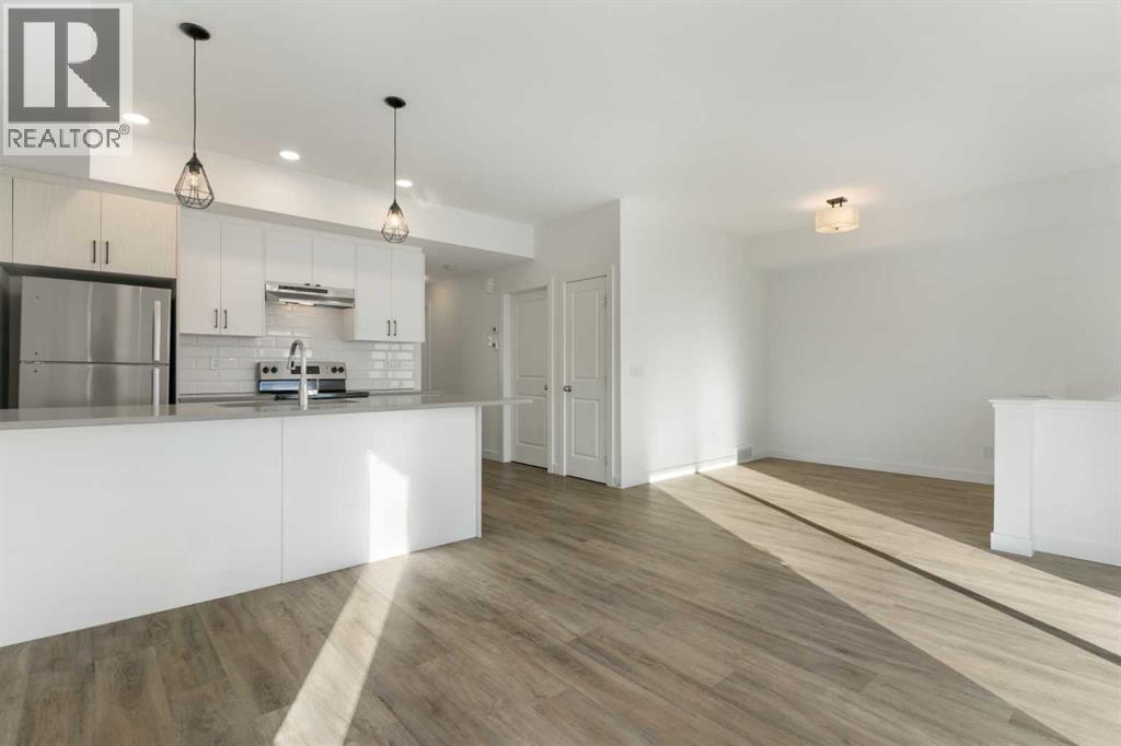 602, 24 Rivercrest Drive, Cochrane, Alberta  T4C 2C5 - Photo 2 - A2292589