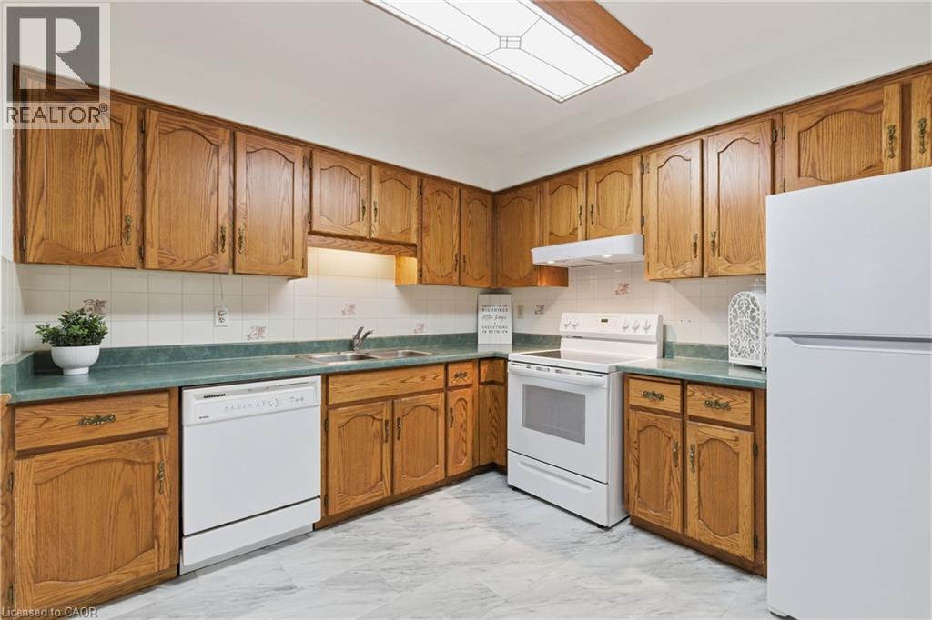 8 Village Green Boulevard Unit# 208, Stoney Creek, Ontario  L8G 5B8 - Photo 9 - 40811392