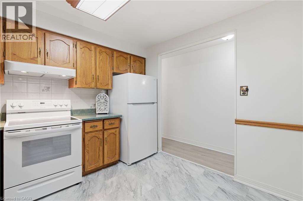 8 Village Green Boulevard Unit# 208, Stoney Creek, Ontario  L8G 5B8 - Photo 12 - 40811392