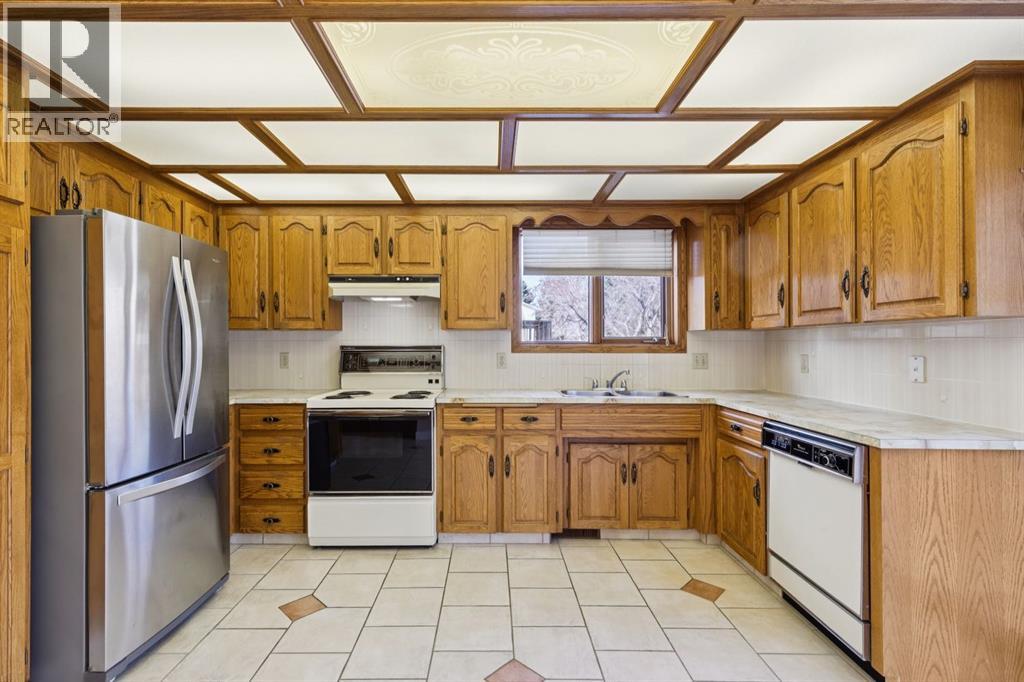 68 Woodstock Road Sw, Calgary, Alberta  T2W 5W2 - Photo 20 - A2289072