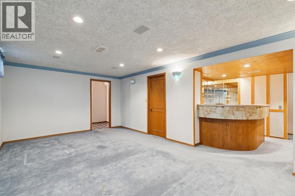 68 Woodstock Road Sw, Calgary, Alberta  T2W 5W2 - Photo 39 - A2289072