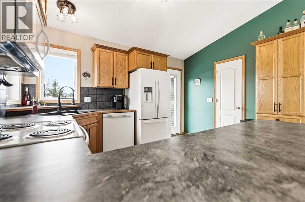 22 Mcdougall Close, Penhold, Alberta  T0M 1R0 - Photo 20 - A2290734