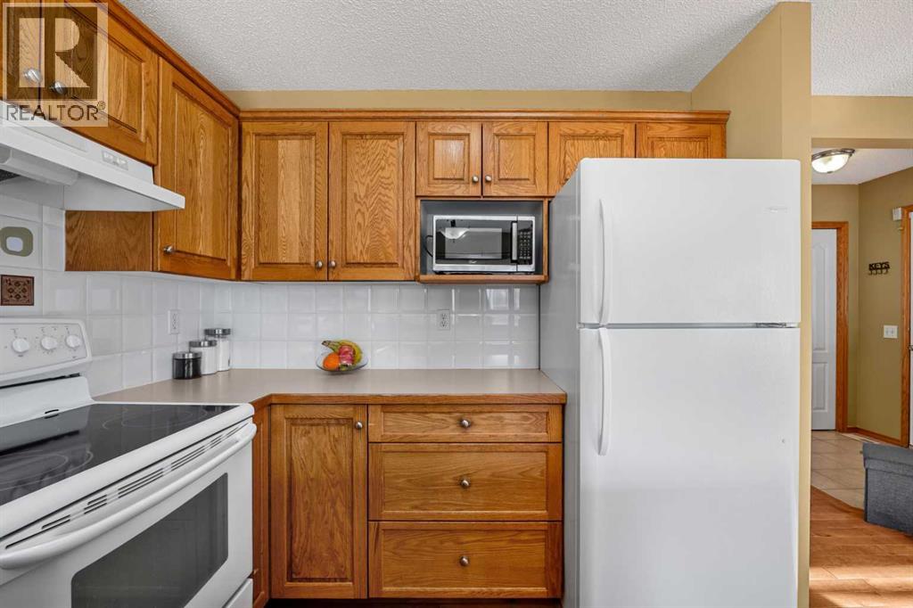 132 Bow Ridge Drive, Cochrane, Alberta  T4C 1V8 - Photo 7 - A2282061