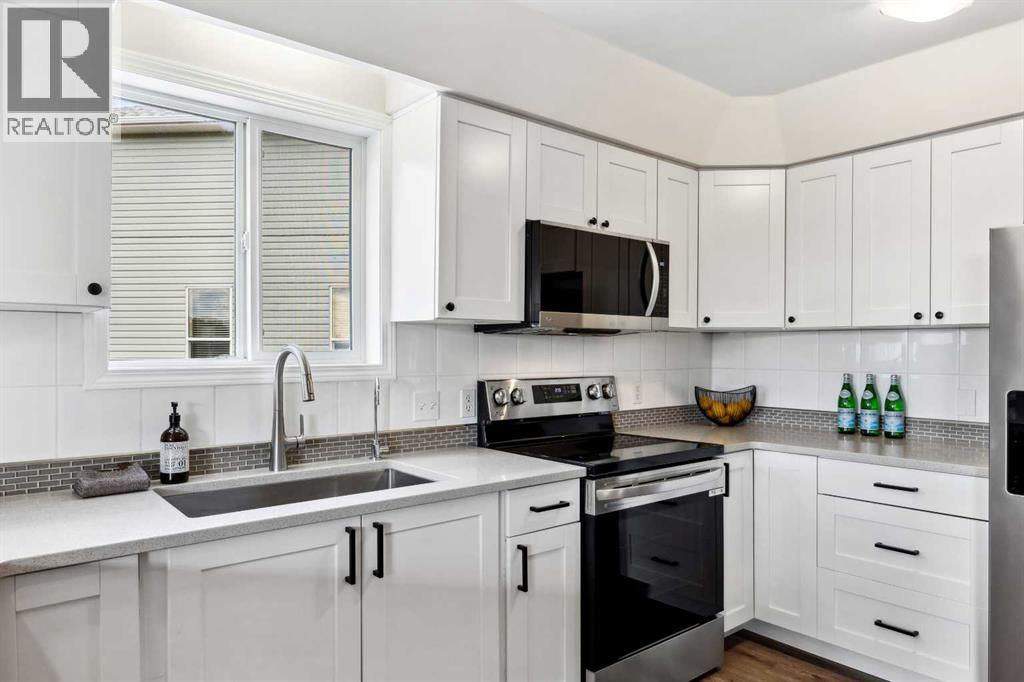 29 Ross Place, Crossfield, Alberta  T0M 0S0 - Photo 5 - A2292237