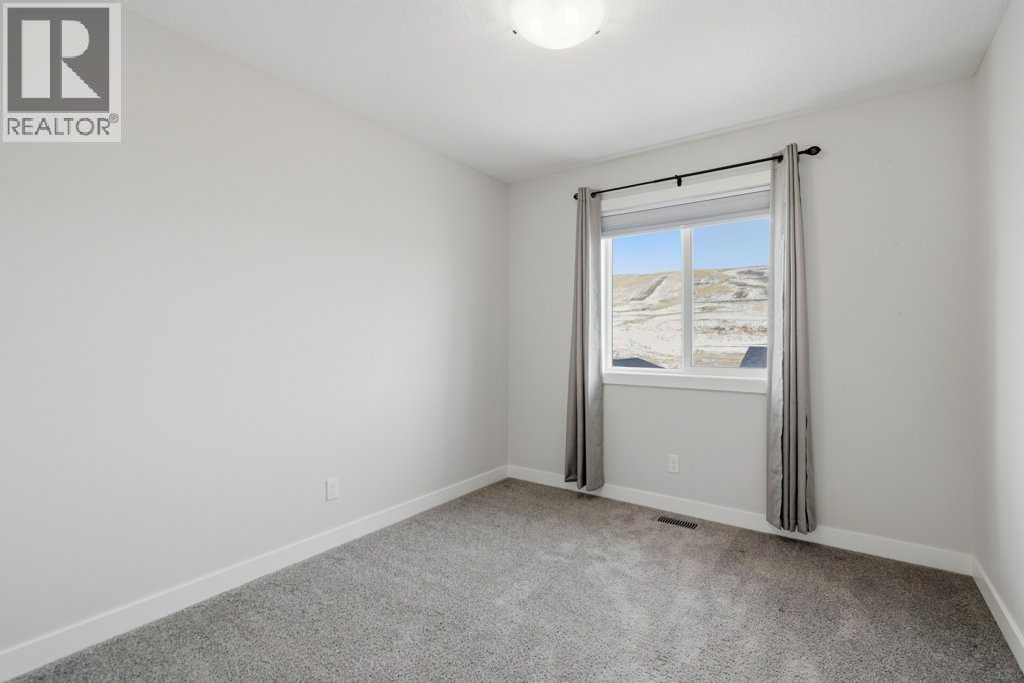 311 Wolf Creek Way Se, Calgary, Alberta  T2X 4Y8 - Photo 23 - A2290796