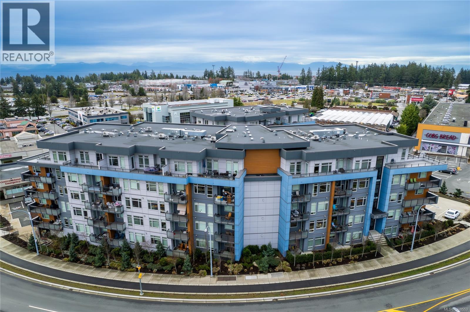 202 6540 Metral Dr, Nanaimo, British Columbia  V9T 2L8 - Photo 1 - 1028553