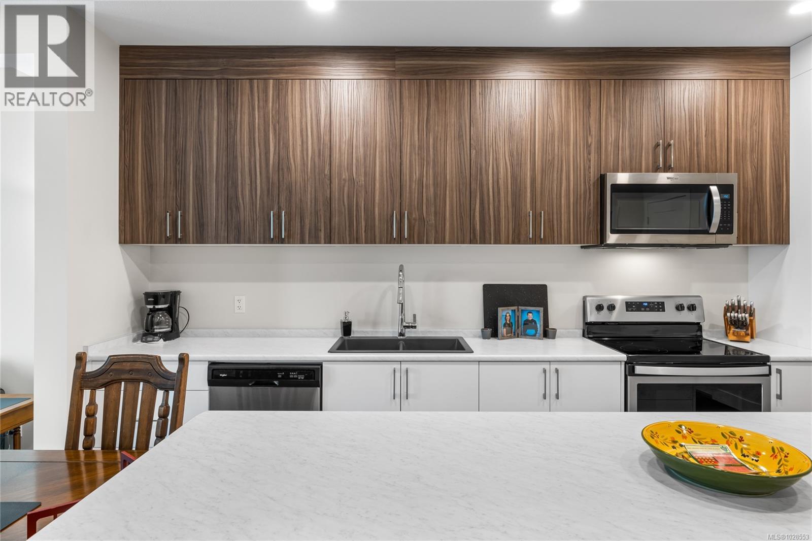 202 6540 Metral Dr, Nanaimo, British Columbia  V9T 2L8 - Photo 7 - 1028553