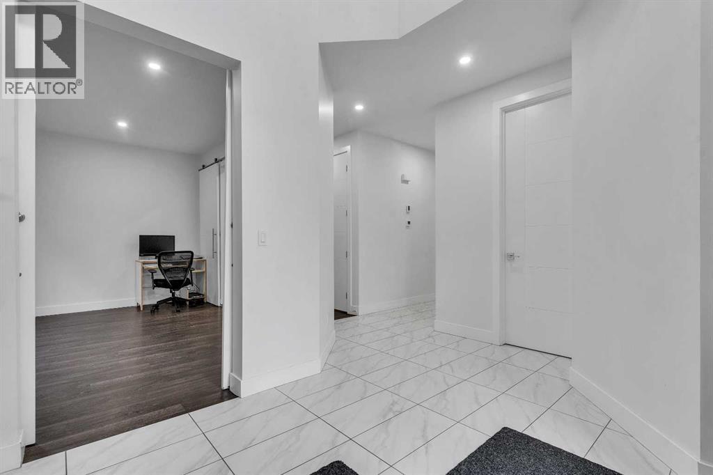 205 Kinniburgh Cove, Chestermere, Alberta  T1X 0Y6 - Photo 5 - A2291809