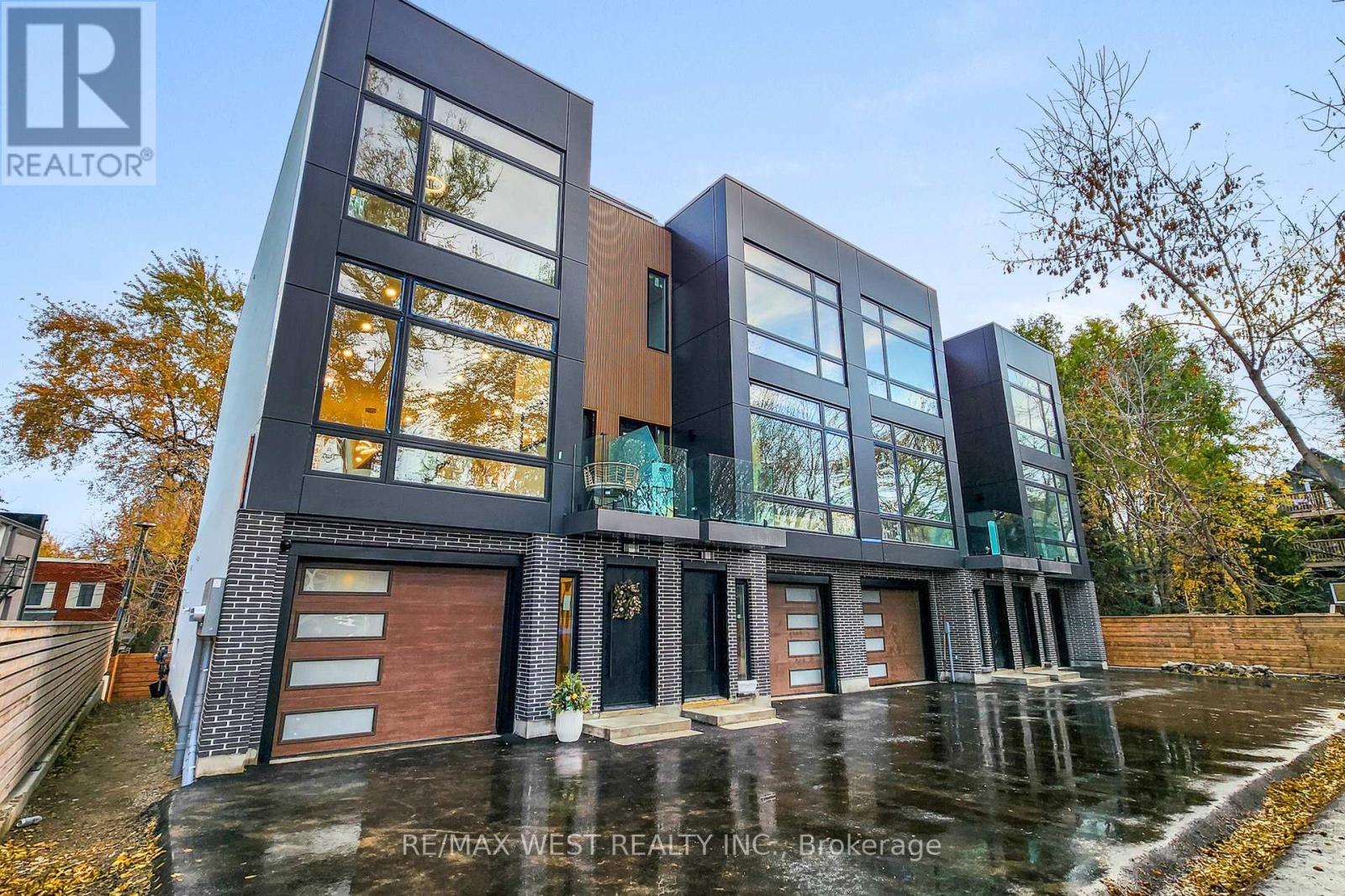 Welcome to 2639R Dundas St Unit 2,  Newly custom built 2600 Sq Ft sophisticated luxury townhouse tucked just behind Dundas on a private lot, exclusive complex of ONLY4 UNITS.  Features  356 Sq Ft roof top deck with skyline/CN tower views, a private backyard and a glass balcony off the kitchen to enjoy the outdoors. Refined craftsmanship and superior high-end finishes throughout sure to impress,  featuring an open floor plan, sleek custom made 15 ft kitchen  9x3 ft quartz island with  waterfall feature , floor to ceiling windows. Airy bright family room with large window, media wall,  fireplace and open shelves. Master bedroom retreat with floor to ceiling windows, 12x5 walk-in closet with custom built in cabinets, Spa like  bath features deep whirlpool tub, glass shower with waterfall, and heated floors. Bedrooms 2&3 both have double built in closets and share a 4-pc bath.  Features 12 feet ceilings on main, 10 feet on second, and 9 feet on third. Skylight over staircase brings natural light to all levels. Welcoming foyer with 6x4 ceramic tiles with heated floors, floor to ceiling closet/cabinets  and direct access to a 220 sq foot garage. Impressive ground level recreation room with12 foot ceilings, 3pc bath, with direct access to private backyard, this room would also suit a home office, gym or nanny suite. These are just some of the exceptional features of this home, full list on feature sheet. Prime Junction Located within a  short walk to Bloor subway and GO Train line to Downtown or Airport, and just minutes to Roncesvalles Village, High Park, and Bloor West Village shops, restaurants and great school district. Truly unique opportunity and great value  that's almost impossible to find. NOTE photo's used are of model unit 4 all units   Identical except  a few interior details (Unit4 End Unit Sold $1.780.000)  Your opportunity awaits to purchase one of the remaining 3 units!!! (id:48254)