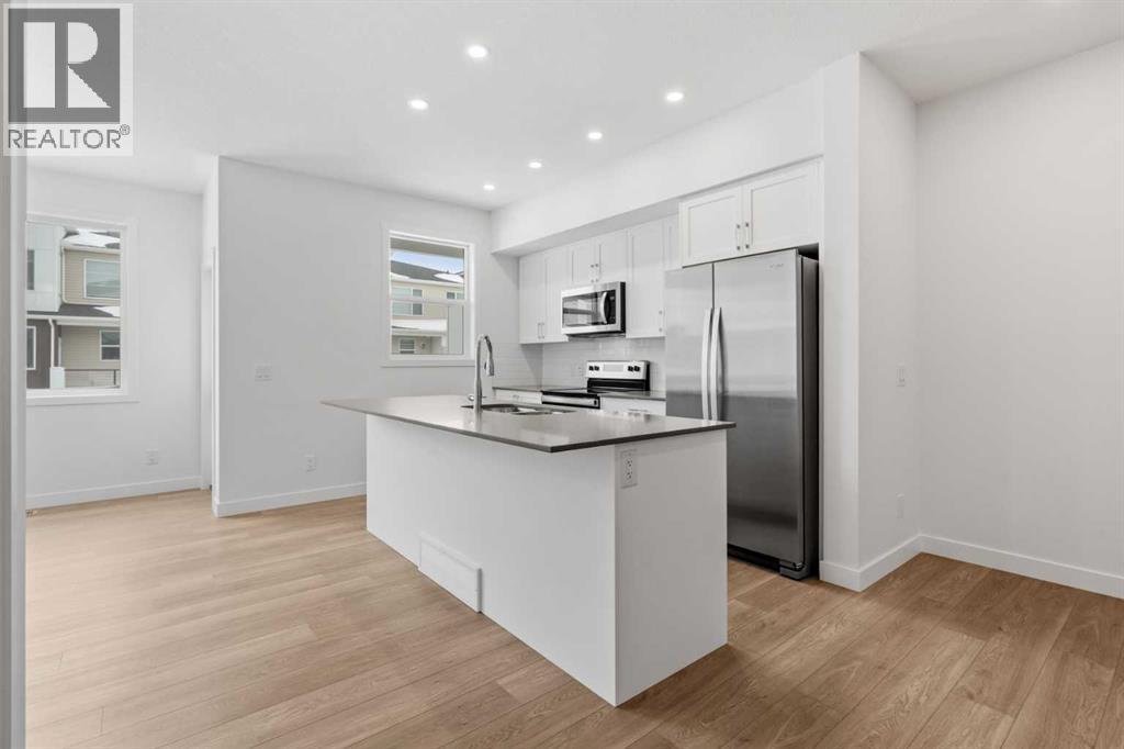 303, 65 Belvedere Point Se, Calgary, Alberta  T2A 7G5 - Photo 2 - A2288302