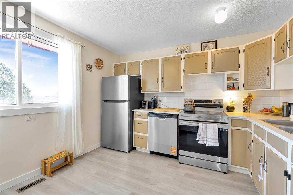 116 Huntwick Way Ne, Calgary, Alberta  T2K 4H3 - Photo 6 - A2291662