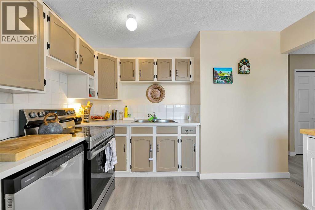 116 Huntwick Way Ne, Calgary, Alberta  T2K 4H3 - Photo 8 - A2291662