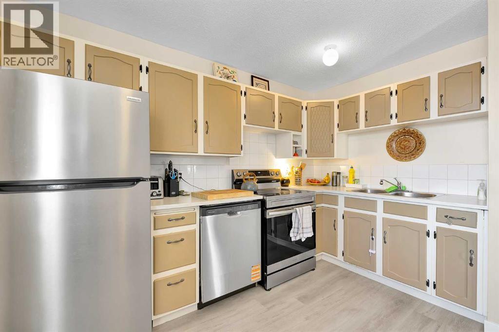 116 Huntwick Way Ne, Calgary, Alberta  T2K 4H3 - Photo 9 - A2291662