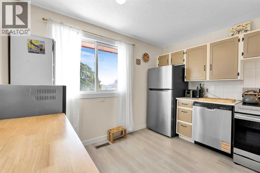 116 Huntwick Way Ne, Calgary, Alberta  T2K 4H3 - Photo 7 - A2291662