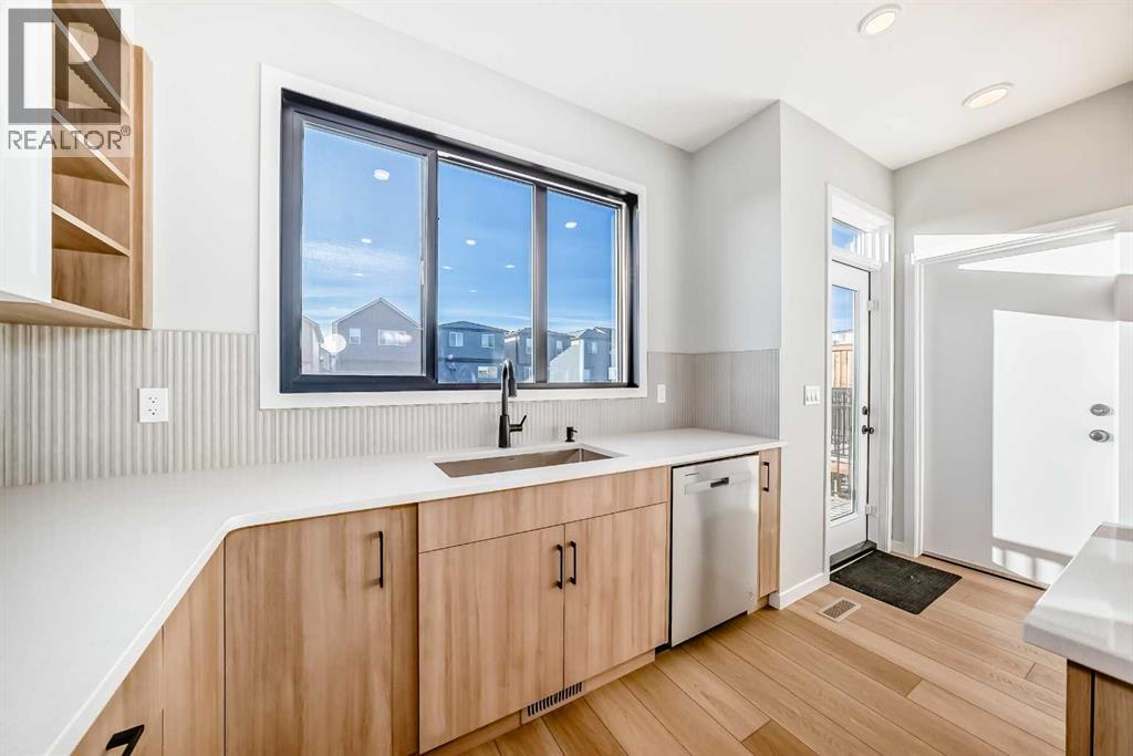 1245 Creekview Drive Sw, Calgary, Alberta  T2X 5Y7 - Photo 8 - A2291658