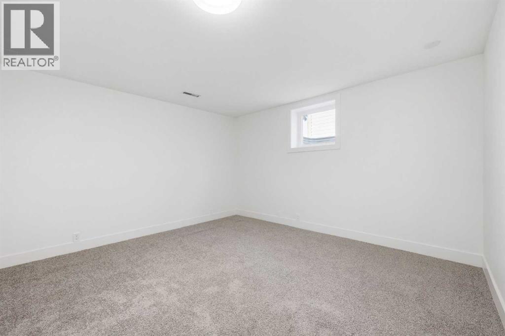 36 Lake Adams Place Se, Calgary, Alberta  T2J 3S8 - Photo 33 - A2291814