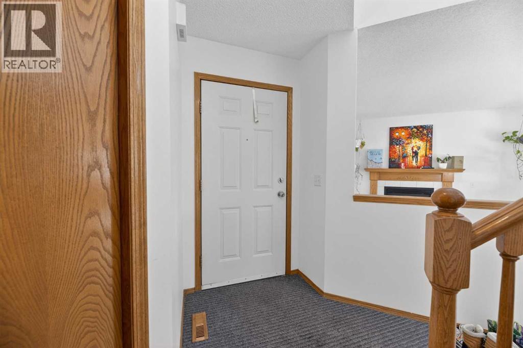 592 Meadowbrook Bay Se, Airdrie, Alberta  T4A 2A9 - Photo 11 - A2290512